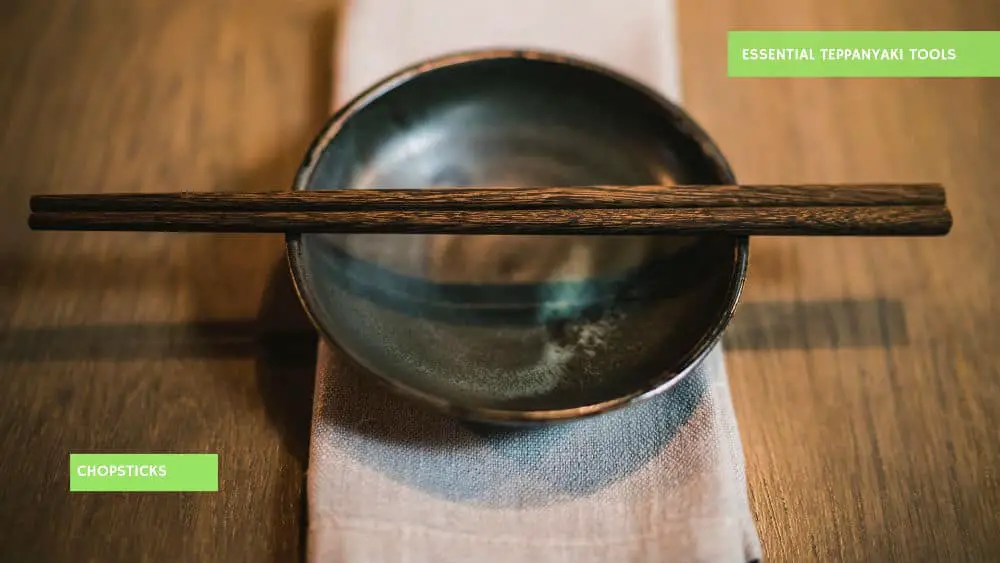 Chopsticks on a ceramic bowl