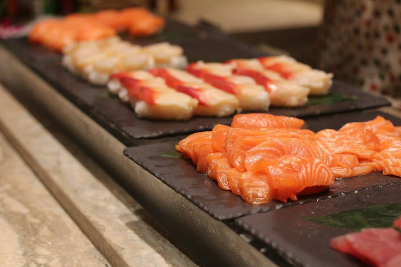 a plate of sashimi