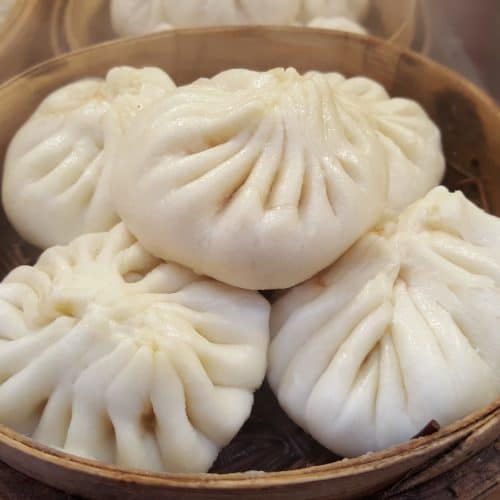 a bowl of japanese steamed bun