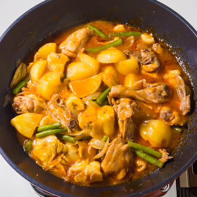 Chicken Pechay and banana in a wok pan