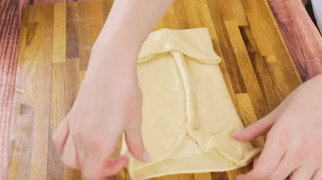 Fold the edges over the shortening mixture