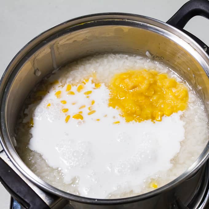 Ginataang Mais and rice getting cooked