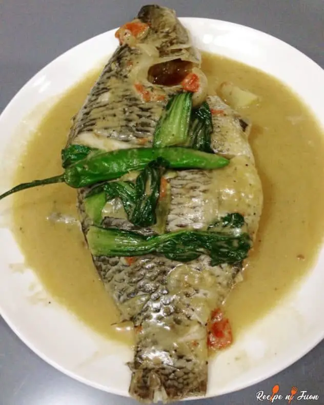 Ginataang tilapia recipe (Filipino fish in coconut sauce dish)