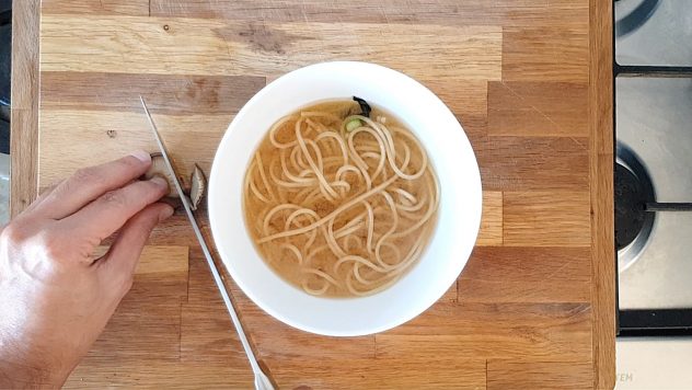 Preparing the bowl of miso soup