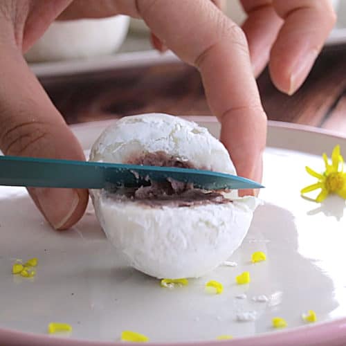 Cutting open a mochi ball