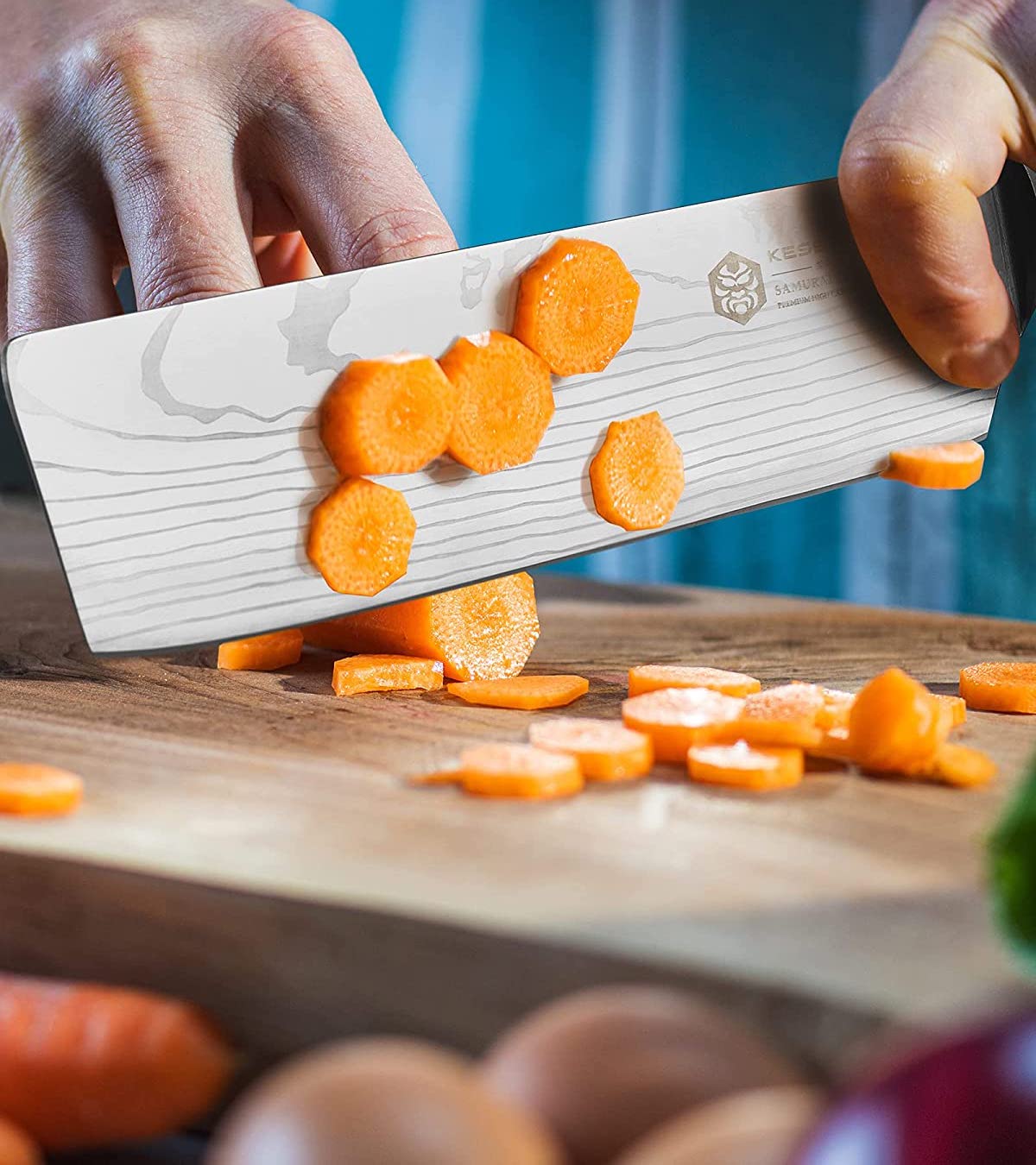 Best Japanese knife for cutting vegetables- Kessaku 7-Inch Nakiri cutting carrots