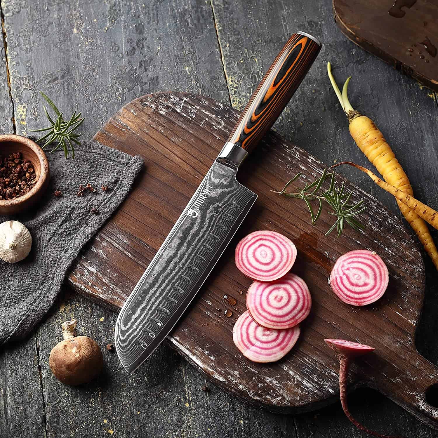 U megliu cuteddu d'acciaio VG-10 santoku universale - JOURMET 7 Damascu Santoku nantu à a tavola