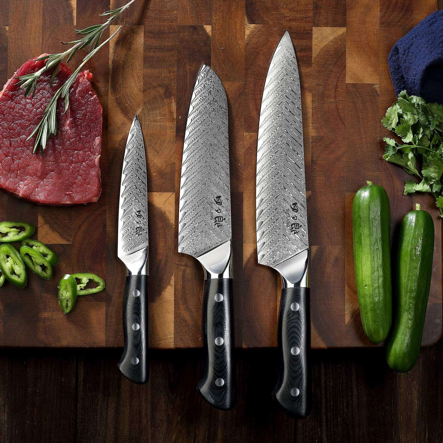 Juego de cuchillos de acero japonés AUS 10 de mejor presupuesto: SIXILANG Damascus tres cuchillos de cocina con tabla de cortar