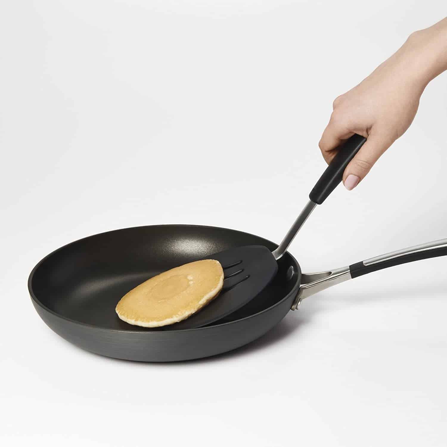 Best spatula for pancakes overall- OXO Good Grips Pancake Turner flipping a pancake