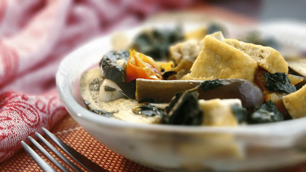 bowl of dinengdeng with a fork on the side