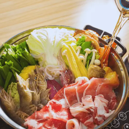 warishita sauce being poured into hot pot