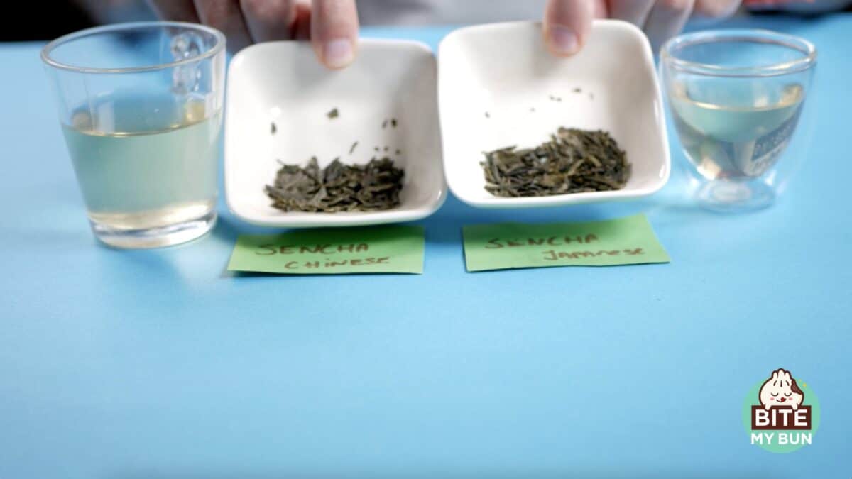 Japanese and Chinese Sencha tea cups and leaves